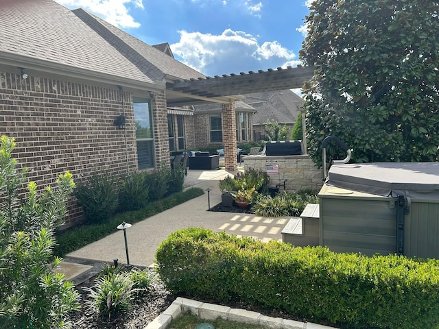602 Limmerhill Dr, Rockwall, TX 75087 - view of patio featuring an outdoor living space, a pergola, and a hot tub