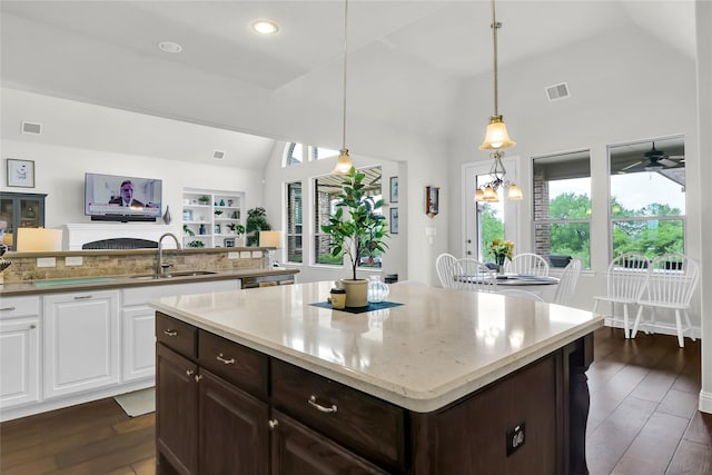 602 Limmerhill Dr, Rockwall, TX 75087 - kitchen featuring visible vents, a sink, dark wood-style flooring, and white cabinets