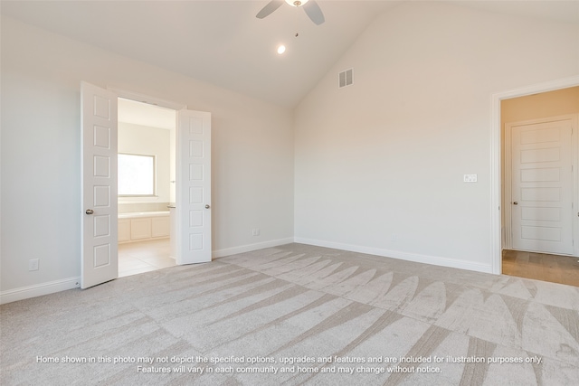 spare room featuring high vaulted ceiling, ceiling fan, light colored carpet, and visible vents