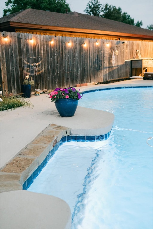 view of pool featuring fence and a fenced in pool