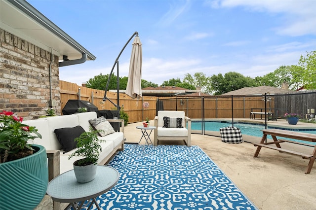 7213 Timberline Dr, Rowlett, TX 75089 - fenced backyard with an outdoor living space, grilling area, and a patio