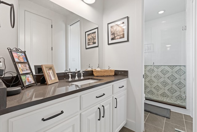 full bath featuring vanity and a stall shower