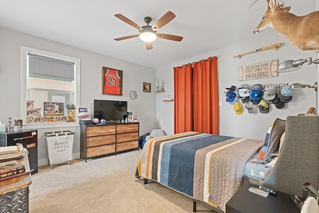carpeted bedroom featuring a ceiling fan