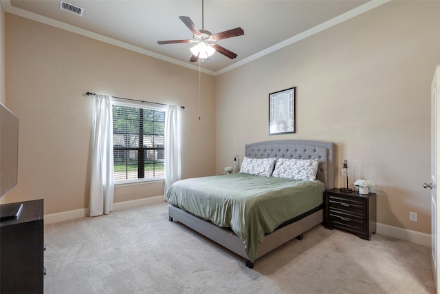 bedroom with crown molding, baseboards, light colored carpet, and visible vents