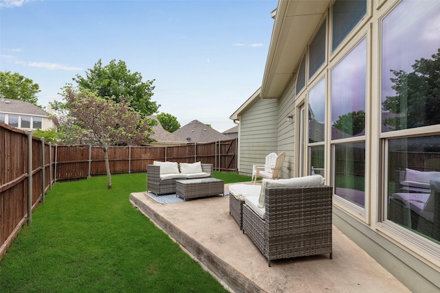 view of yard with an outdoor living space, a fenced backyard, and a patio