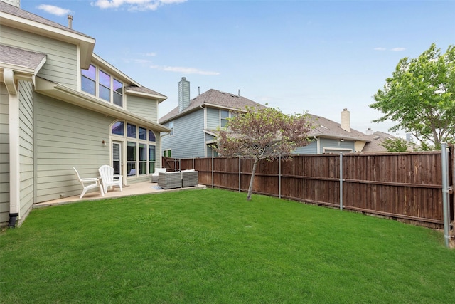 view of yard with a fenced backyard and a patio area