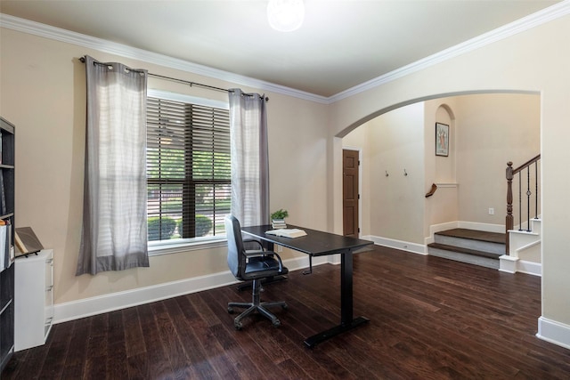 office with crown molding, arched walkways, baseboards, and wood finished floors