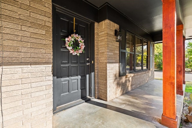 property entrance with a porch