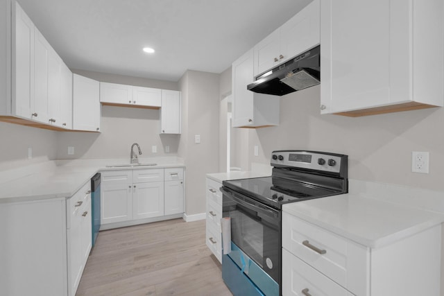 kitchen with a sink, light wood-style floors, under cabinet range hood, white cabinets, and electric stove