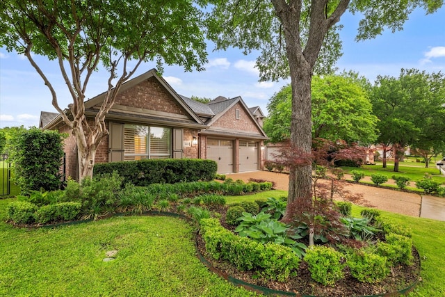 1619 Villa Ct, Corinth, TX 76210 - view of front of home with brick siding, an attached garage, a front yard, and driveway