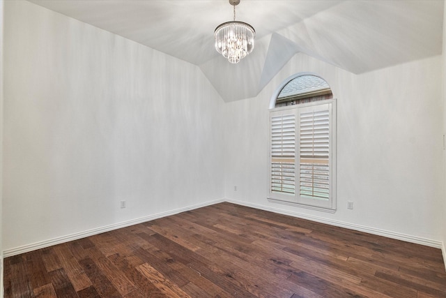 1619 Villa Ct, Corinth, TX 76210 - spare room featuring a chandelier, dark wood-style flooring, lofted ceiling, and baseboards