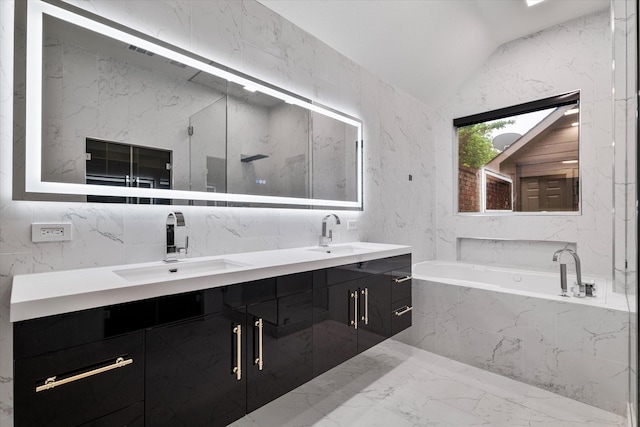 1619 Villa Ct, Corinth, TX 76210 - bathroom featuring marble tiled flooring, double vanity, vaulted ceiling, a bath, and a marble finish shower