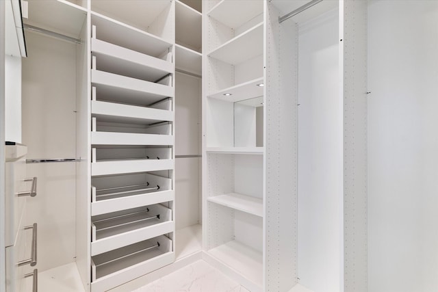 1619 Villa Ct, Corinth, TX 76210 - spacious closet featuring marble look tile flooring