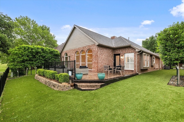 1619 Villa Ct, Corinth, TX 76210 - back of property with brick siding, a patio area, and roof with shingles