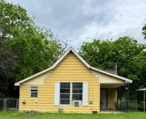 311 Edna St, Weatherford, TX 76086 - rear view of house featuring a yard and fence