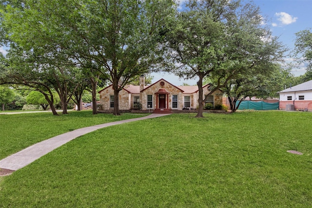 1402 Corto Dr, Dallas, TX 75218 - single story home with stone siding, central air condition unit, and a chimney