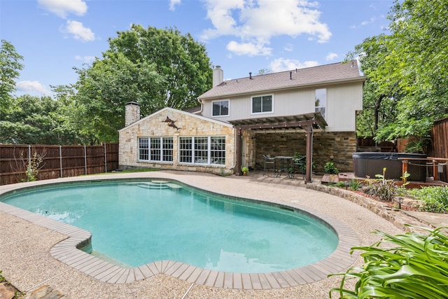 view of swimming pool with a hot tub, a pergola, a fenced backyard, and a patio area