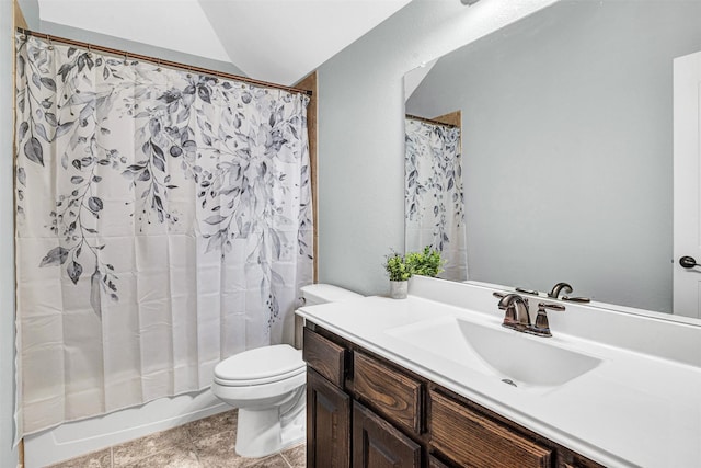 full bath with vanity, shower / tub combo with curtain, vaulted ceiling, and toilet