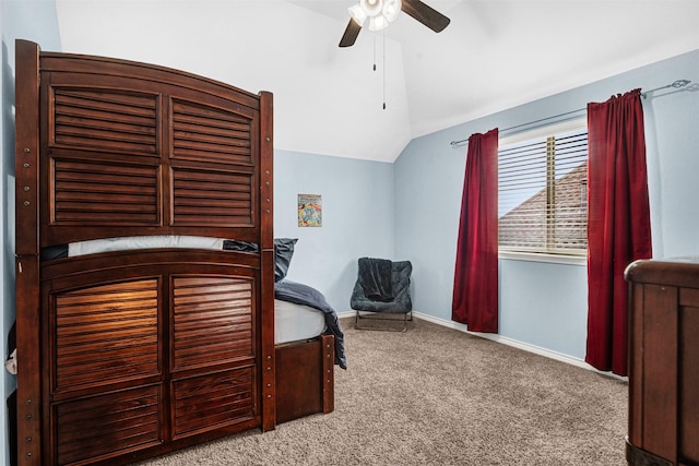 bedroom featuring carpet floors, baseboards, a ceiling fan, and vaulted ceiling