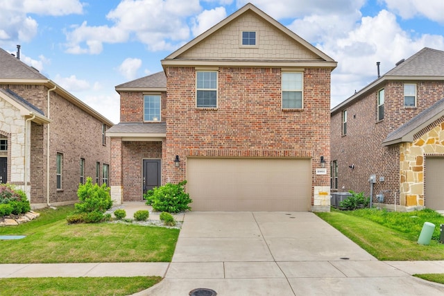 2561 Pettus Dr, Forney, TX 75126 - traditional-style house with brick siding, central AC, driveway, and a front yard