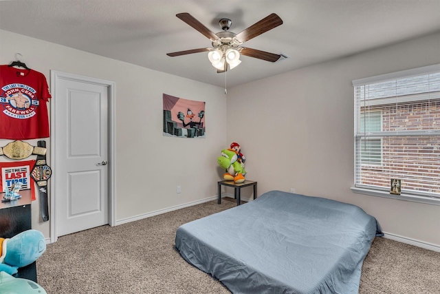 2561 Pettus Dr, Forney, TX 75126 - bedroom featuring carpet floors, baseboards, and ceiling fan