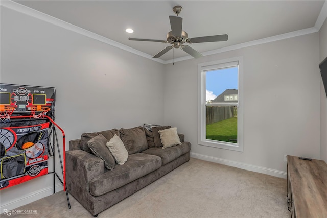 carpeted living area with recessed lighting, ceiling fan, ornamental molding, and baseboards