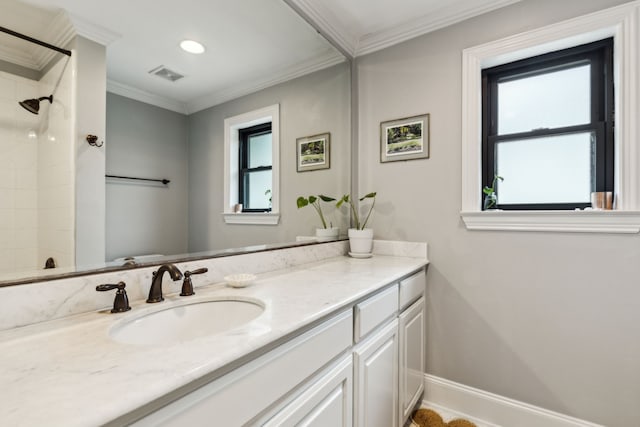 bathroom featuring vanity, walk in shower, and a wealth of natural light