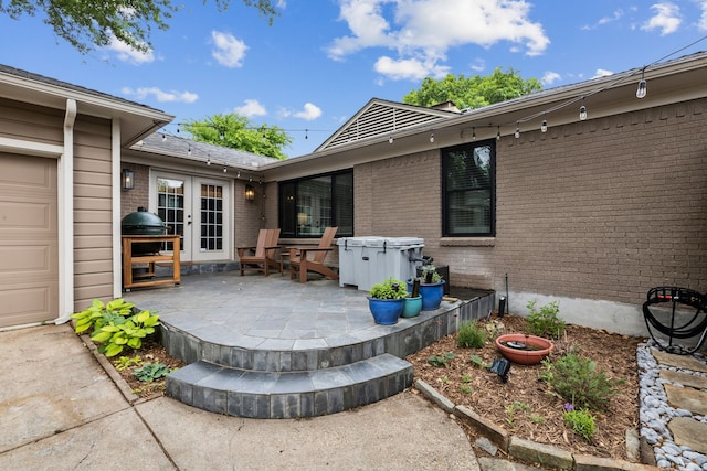 view of patio with grilling area and french doors