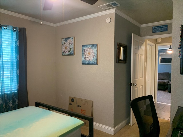 bedroom with visible vents, baseboards, crown molding, and ceiling fan