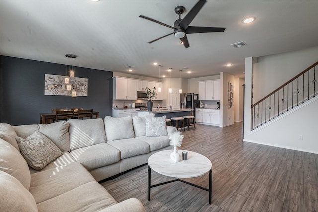 600 Goldenrod Ln, Princeton, TX 75407 - living area featuring a ceiling fan, wood finished floors, and a wealth of natural light
