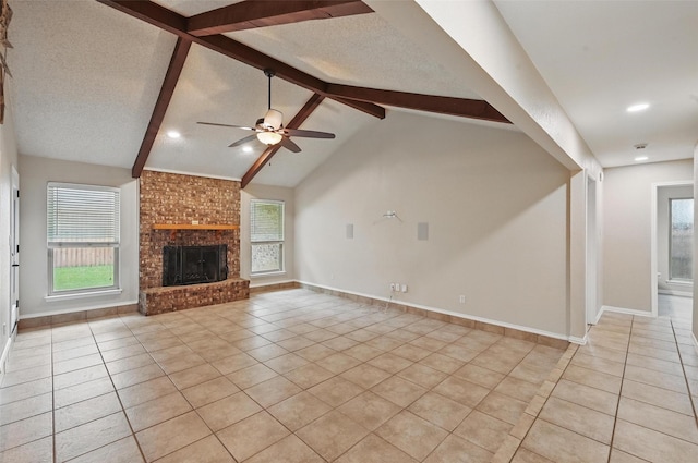 unfurnished living room featuring a healthy amount of sunlight and light tile patterned floors