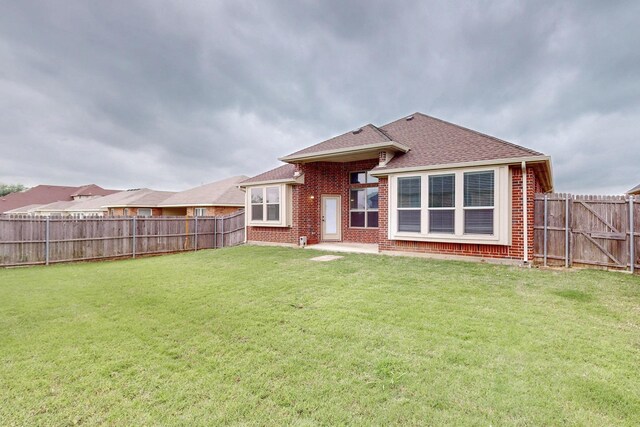5012 Spruce St, Krum, TX 76249 - unfurnished bedroom featuring baseboards, visible vents, wood finished floors, and lofted ceiling
