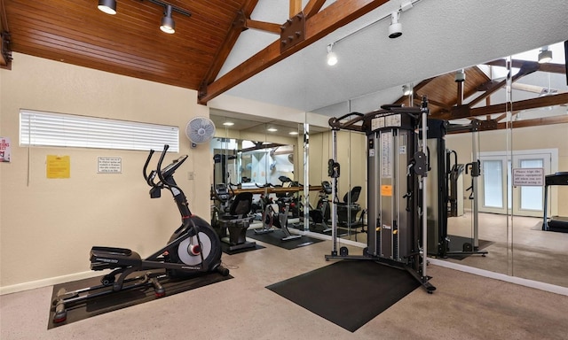 gym featuring track lighting, baseboards, wood ceiling, and lofted ceiling