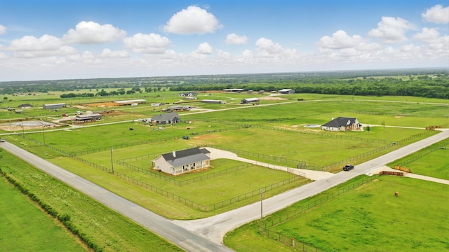 birds eye view of property featuring a rural view
