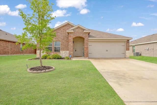 traditional-style home with driveway, central air condition unit, brick siding, a front lawn, and an attached garage