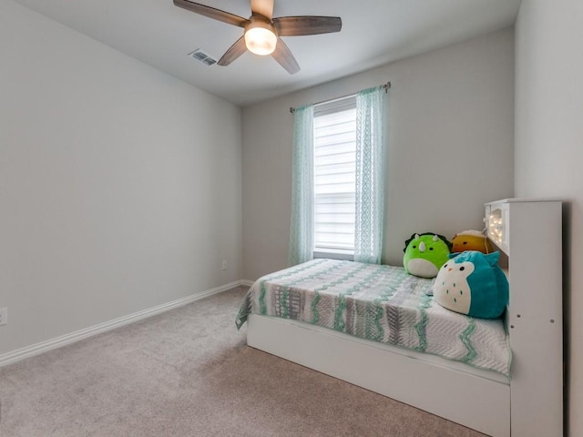 bedroom with visible vents, carpet, ceiling fan, and baseboards