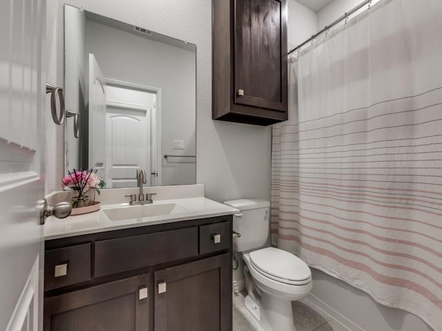 full bathroom with vanity, tile patterned flooring, visible vents, shower / bath combo with shower curtain, and toilet