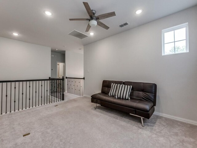 sitting room with visible vents, a ceiling fan, and recessed lighting