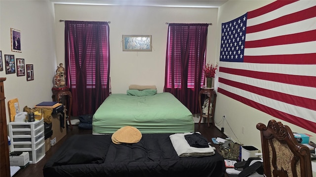 bedroom featuring wood finished floors