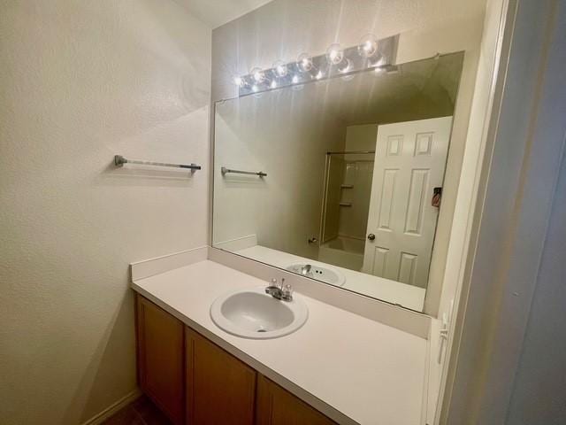 full bath with tub / shower combination and vanity