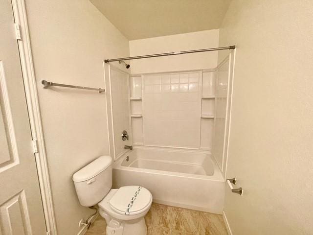 full bath with toilet, baseboards, shower / bath combination, and tile patterned floors