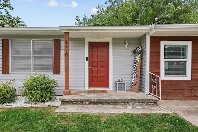 entrance to property with a porch