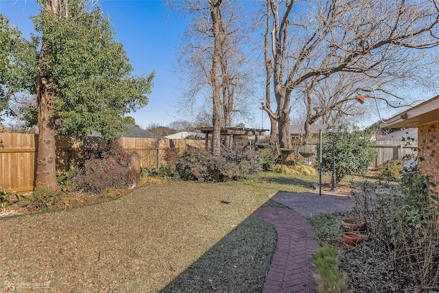 view of yard featuring a fenced backyard