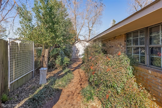 view of yard with fence