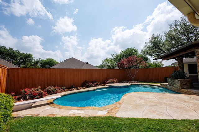 view of pool with a fenced in pool, a fenced backyard, and a patio area