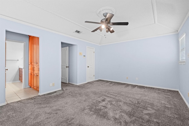 1013 Briarcreek Dr, Arlington, TX 76012 - unfurnished bedroom with ceiling fan, carpet floors, baseboards, lofted ceiling, and visible vents