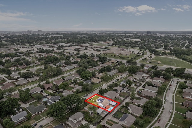 birds eye view of property with a residential view