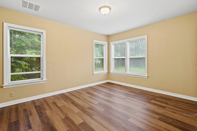 4416 Surrey St, Fort Worth, TX 76133 - empty room featuring baseboards and wood finished floors