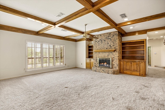 5311 Country Club Dr, Granbury, TX 76049 - unfurnished living room featuring a ceiling fan, light colored carpet, beamed ceiling, a brick fireplace, and recessed lighting
