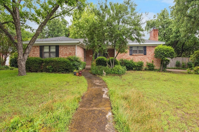 605 Clebud Dr, Euless, TX 76040 - ranch-style house with a chimney and brick siding